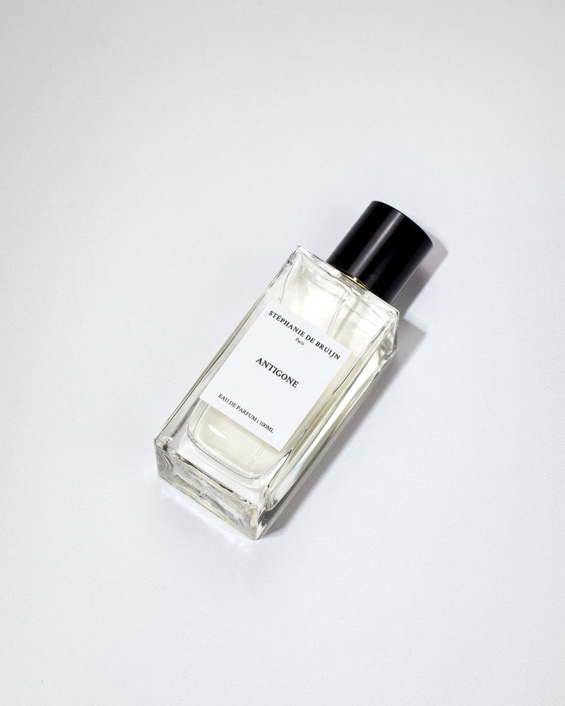 Antigone Stephanie de Bruijn perfume and cologne bottle, 3.4 oz, elegant glass container with floral design, online warehouse product image