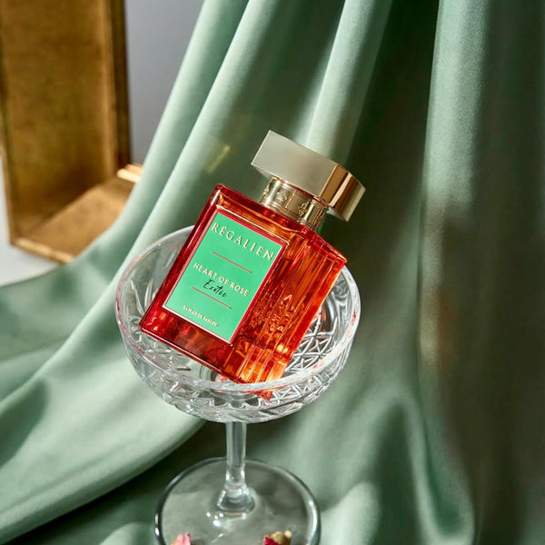 Heart of Rose Exotic Regalien perfume bottle from Online Warehouse, 2.7 oz with elegant floral design.