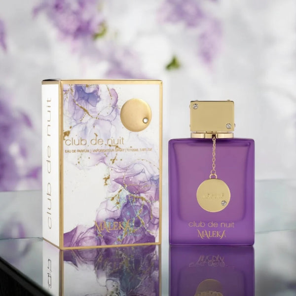 Armaf Club De Nuit Maleka perfume bottle, 3.4oz, with elegant design and label, showcasing the fragrance's luxurious packaging.