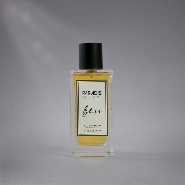 Bliss Paradis des Sens 3.4oz perfume bottle from Pertinacia LLC, elegant packaging with a sleek design and floral accents.