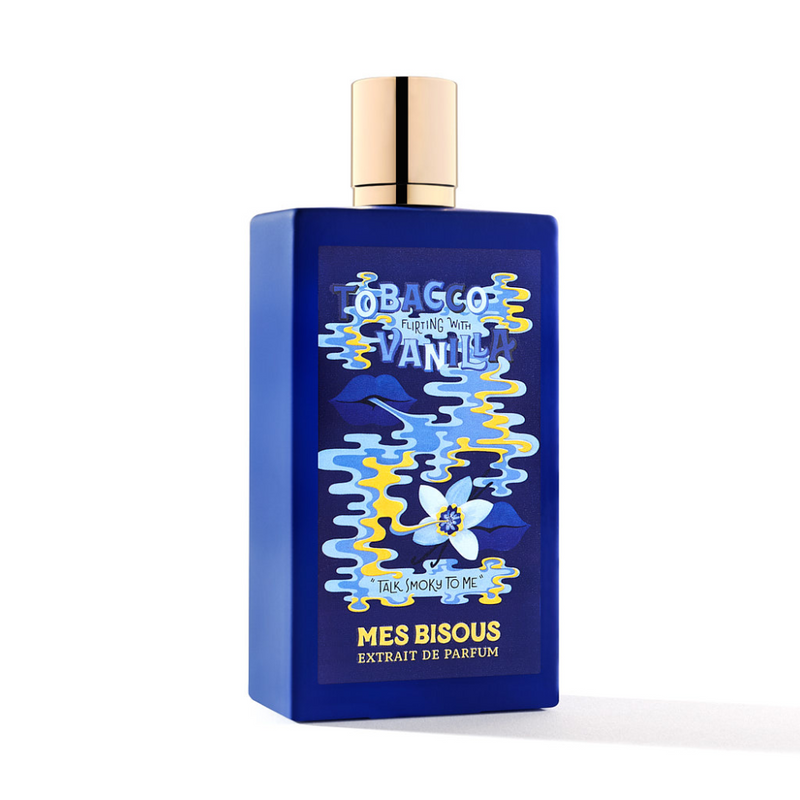 Tobacco and vanilla scented Mes Bisous fragrance in a 3.4 oz bottle, featuring a sleek design with a clear glass container and gold cap.