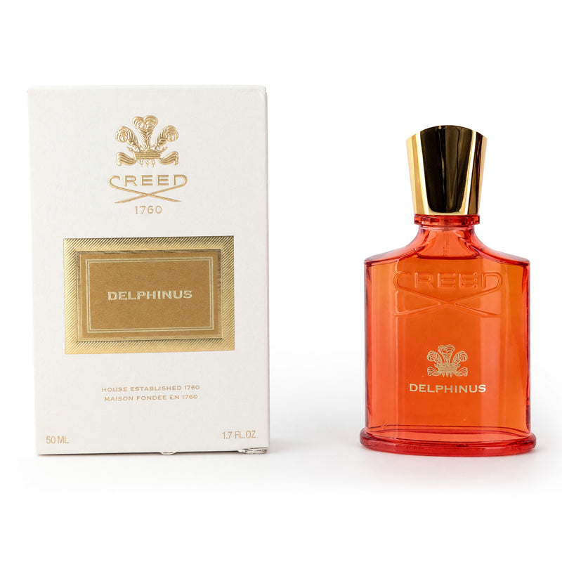 Creed Delphinus 1.7 oz unisex EDP spray bottle with elegant packaging and silver cap, showcasing a luxurious fragrance.