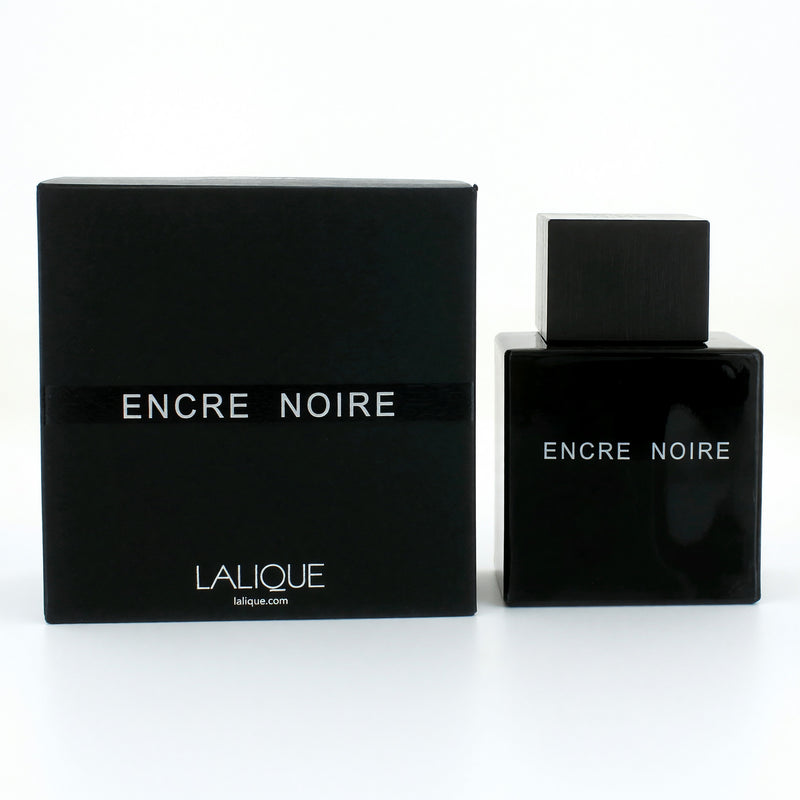 Lalique Encre Noire men's 3.3 oz EDT spray bottle with dark, sleek design and minimalist label, placed on a neutral background.