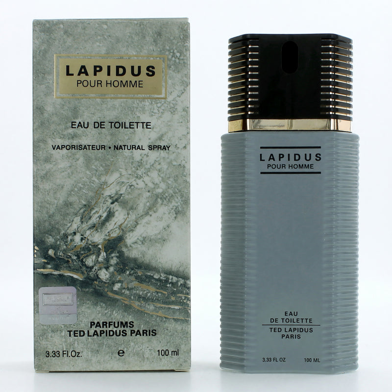 Ted Lapidus Lapidus men's 3.3 oz EDT spray bottle, sleek design, shown on a reflective surface with the product label visible.