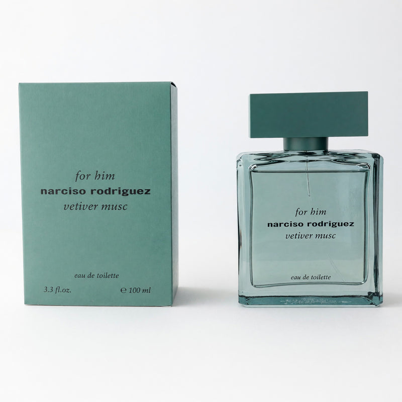 Narciso Rodriguez Vetiver Musc 3.4oz men's EDT spray bottle, sleek design with clear glass and black cap, on a neutral background.