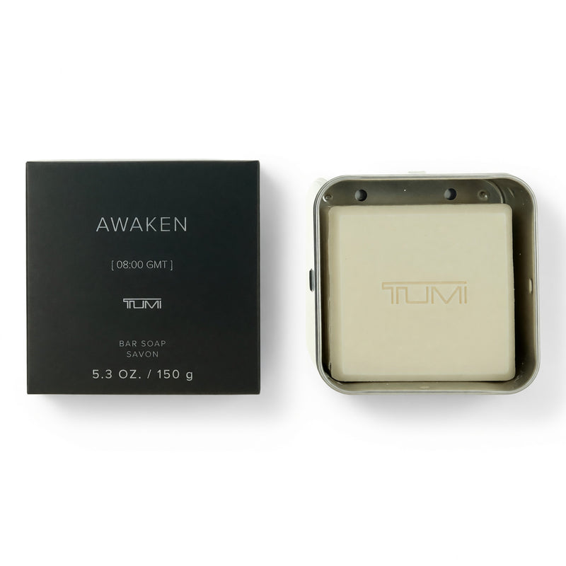 Tumi Awaken 5.3oz men's bar soap with aluminum case, physical product, showcasing the soap and sleek packaging.