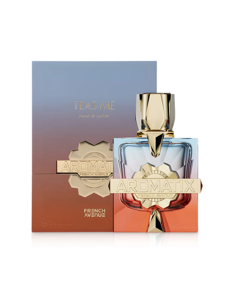 Aromatix Teas Me perfume by Pertinacia Perfume in a 3.4oz bottle with French Avenue etchings, placed beside its box against a white background.