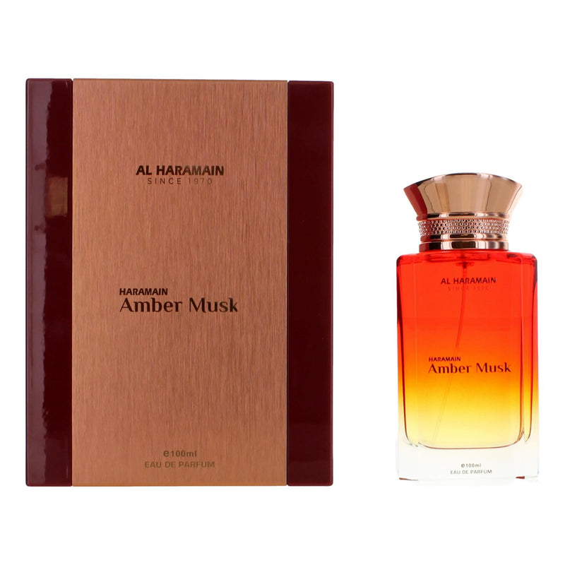 Amber Musk by Al Haramain 3.4 oz unisex EDP spray bottle, featuring a sleek design and amber-colored fragrance liquid.
