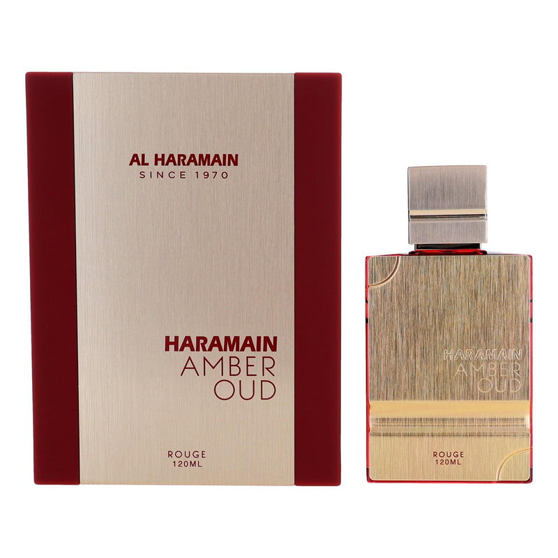Amber Oud Rouge by Al Haramain 4 oz unisex EDP spray featuring a sleek glass bottle with a gold cap and amber-colored liquid.