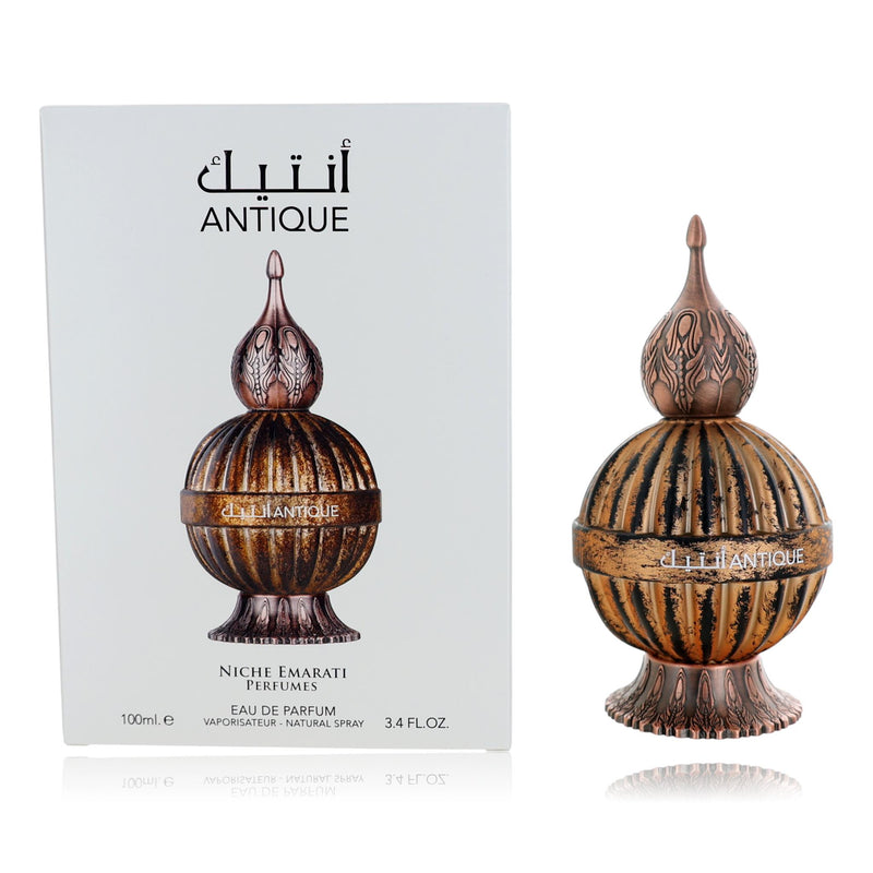 Lattafa Niche Emarati Antique 3.4 oz unisex EDP spray with elegant bottle and intricate design.