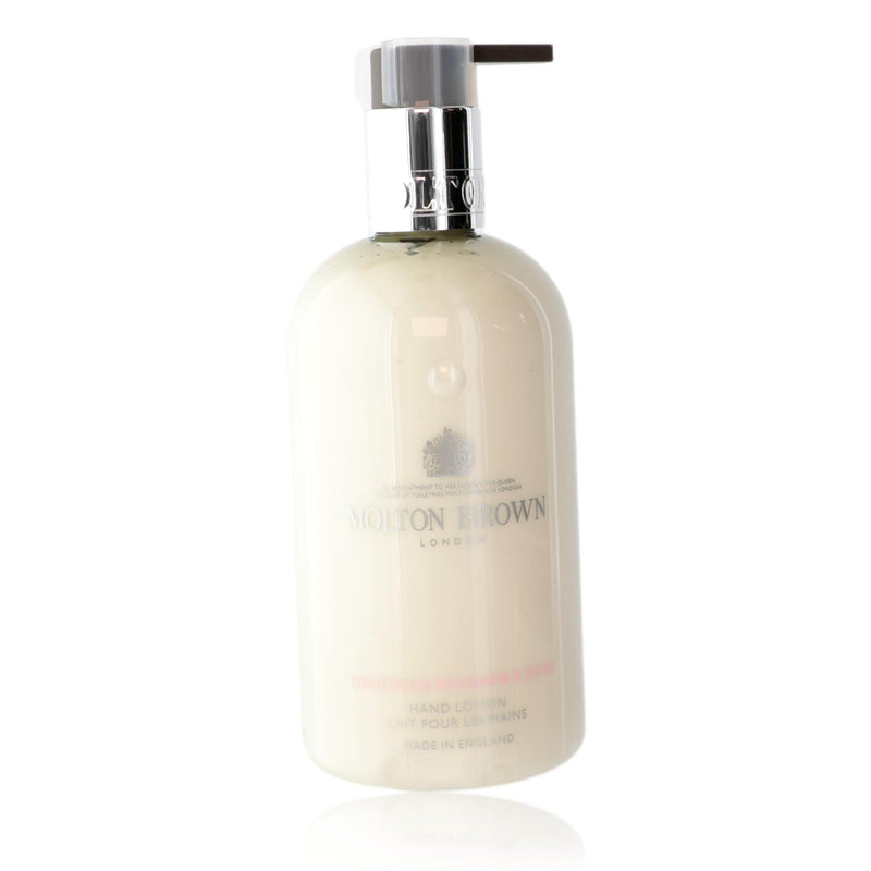 Molton Brown Rhubarb and Rose 10oz hand lotion bottle for unisex use, featuring elegant packaging and a floral, fruity scent.