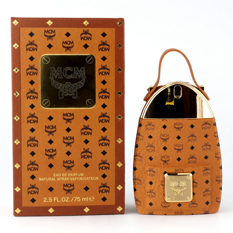 MCM unisex 2.5 oz Eau de Parfum spray bottle, sleek design, featuring the MCM logo and elegant packaging.