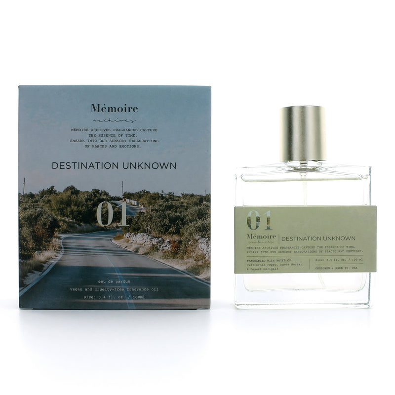 Unisex 3.4 oz Memoire Archives Destination Unknown EDP spray bottle with elegant packaging.