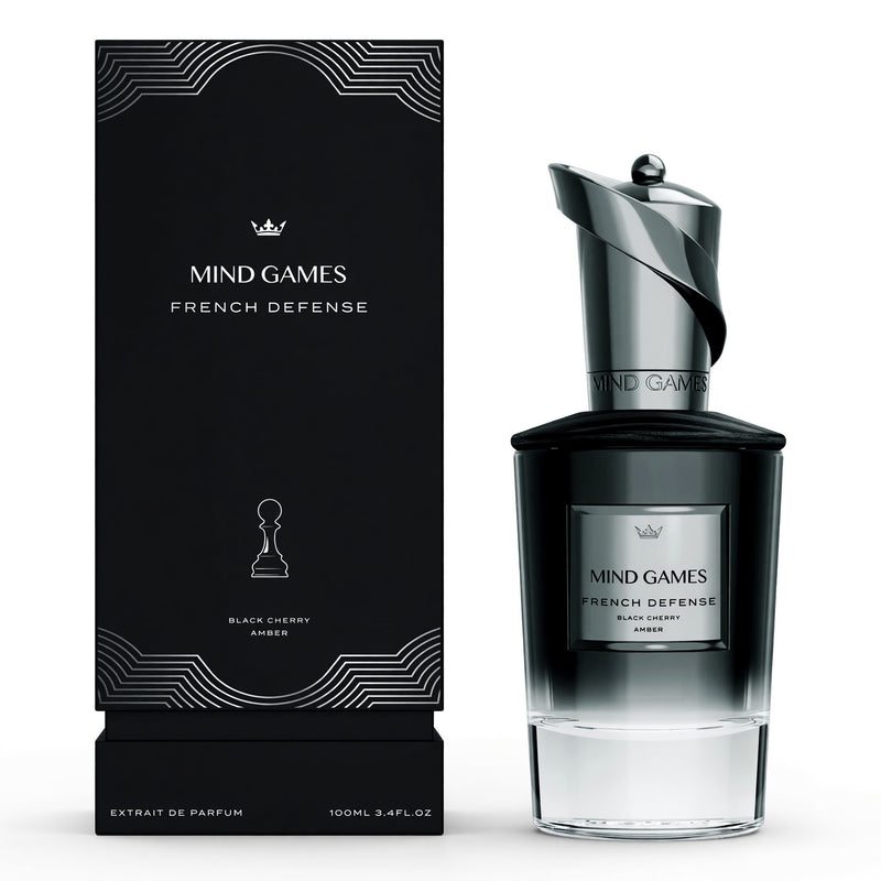 Unisex French Defense by Mind Games 3.4 oz extrait de parfum bottle with elegant packaging and label.