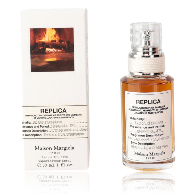 Maison Margiela Replica By The Fireplace 1oz unisex EDT spray bottle, with a sleek minimalist design and textured label.