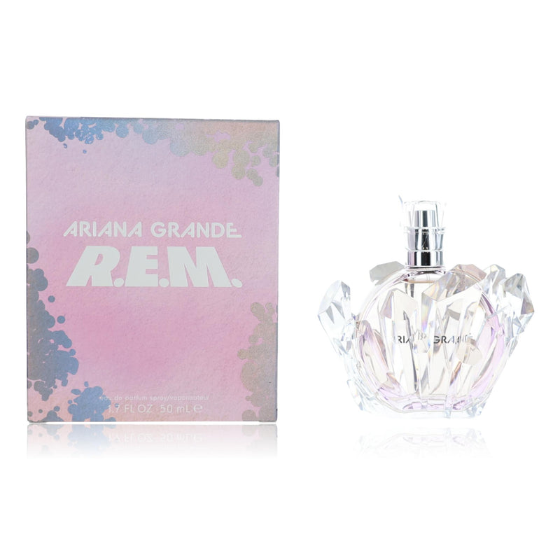 Ariana Grande R.E.M. 1.7 oz women's EDP spray bottle with a sleek, elegant design and floral accents.