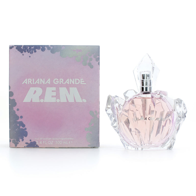 Ariana Grande R.E.M. 3.4 oz women’s Eau de Parfum spray bottle with pink and purple floral design.