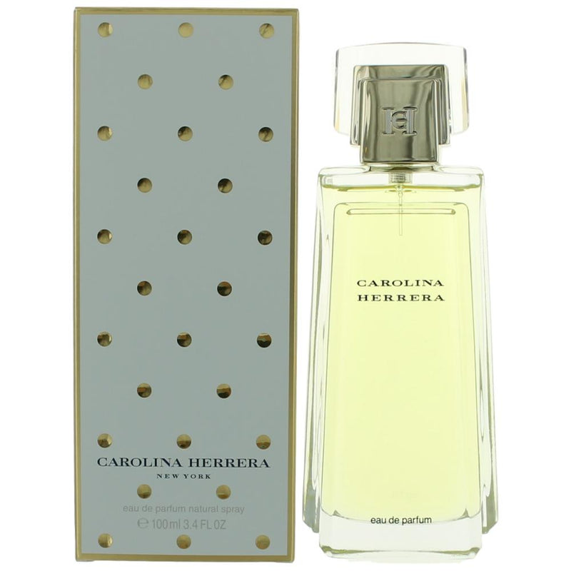 Carolina Herrera 3.4 oz women’s EDP spray bottle with elegant packaging and floral design.