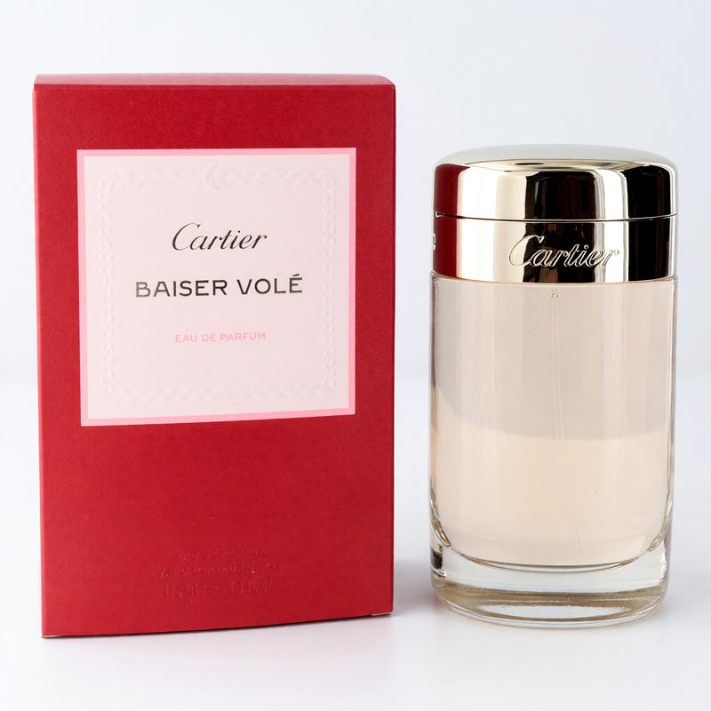 Cartier Baiser Vole 3.3 oz women's EDP spray bottle with elegant floral design and clear glass container.