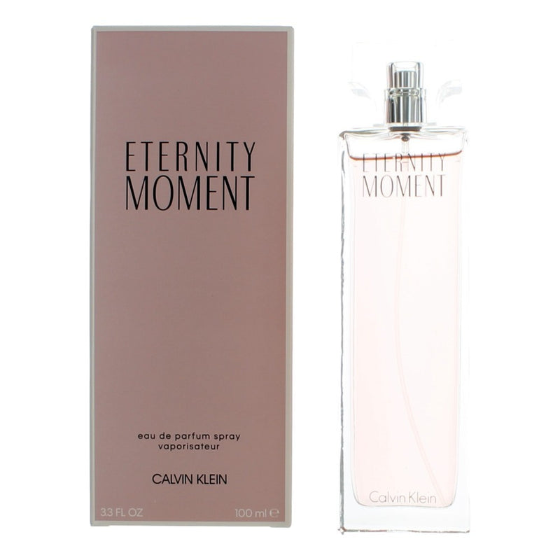 Calvin Klein Eternity Moment 3.3 oz women’s EDP spray bottle, elegant fragrance bottle with floral design.