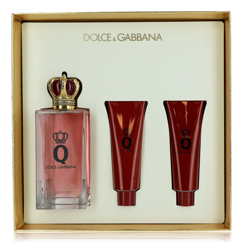 Dolce & Gabbana Q 3-piece gift set for women including perfume, body lotion, and shower gel bottles arranged neatly.