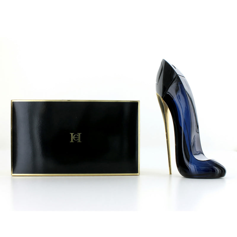 Carolina Herrera Good Girl 5.1 oz women’s EDP spray bottle with sleek black and gold design, featuring a stiletto heel shape.
