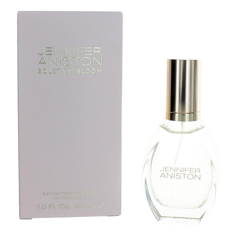 Jennifer Aniston Solstice Bloom 1 oz EDP spray for women, featuring a clear bottle with a floral fragrance, displayed on a neutral background.