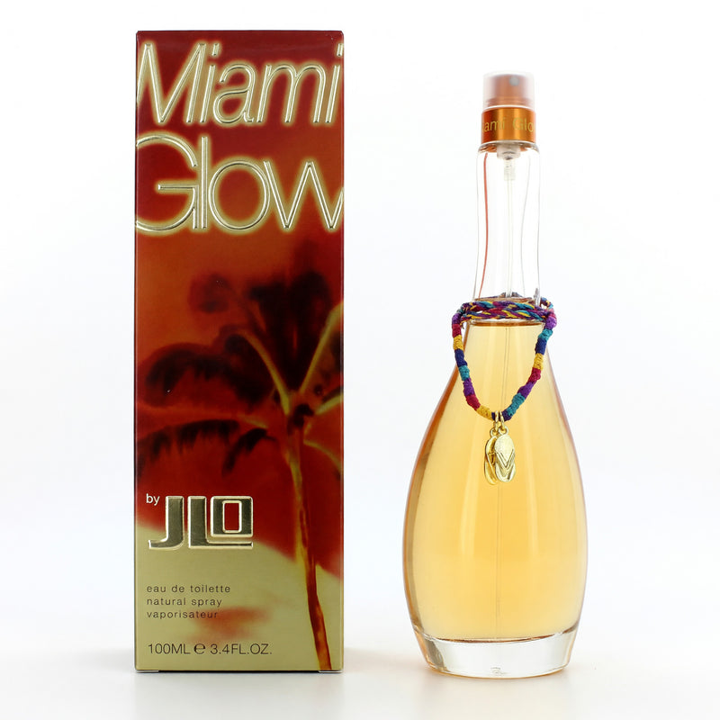 J.Lo Miami Glow 3.4 oz women’s EDT spray bottle with pink and purple floral design and silver cap.