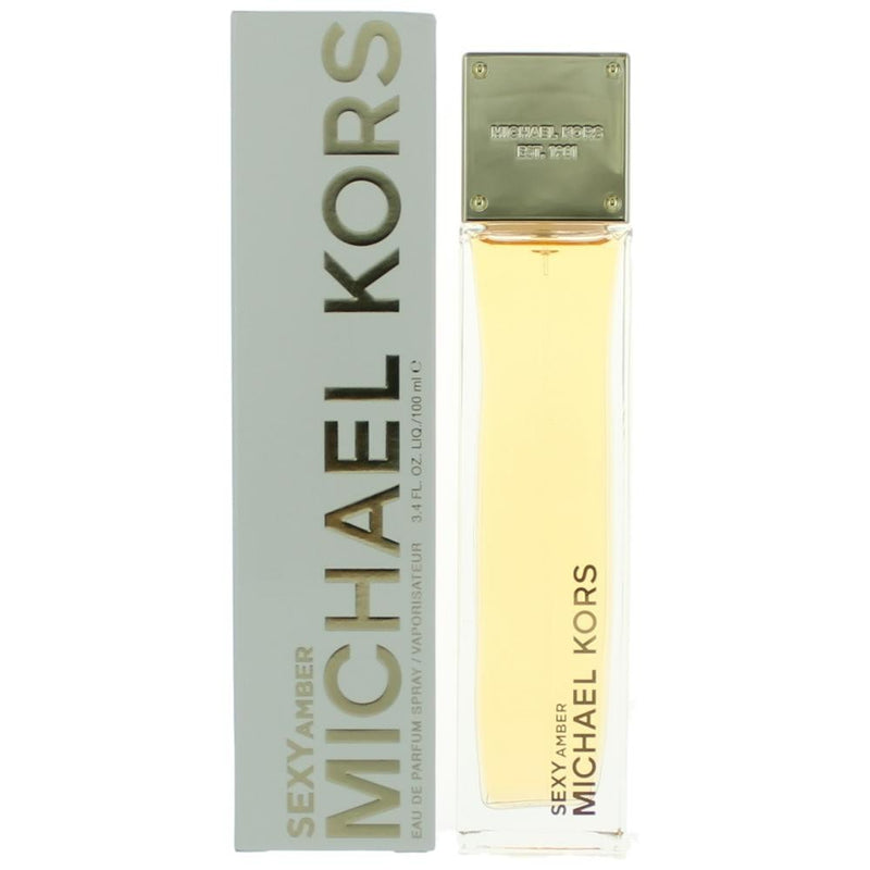 Michael Kors Sexy Amber 3.4 oz EDP spray for women, featuring a sleek bottle with amber-colored fragrance liquid.