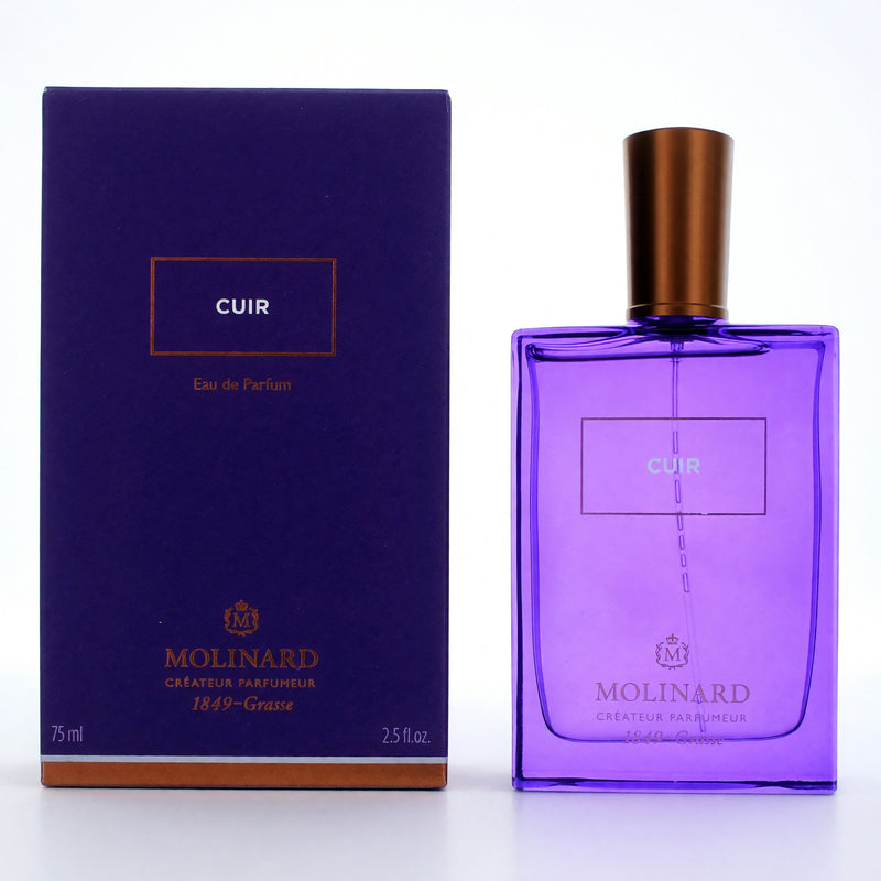 Molinard Cuir 2.5 oz women's EDP spray bottle, elegant perfume packaging with a sleek design and gold accents.