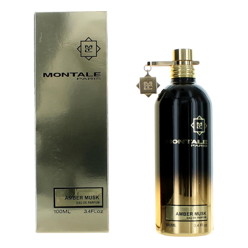 Montale Amber Musk 3.4 oz EDP spray for women, featuring a sleek bottle and amber-colored liquid.