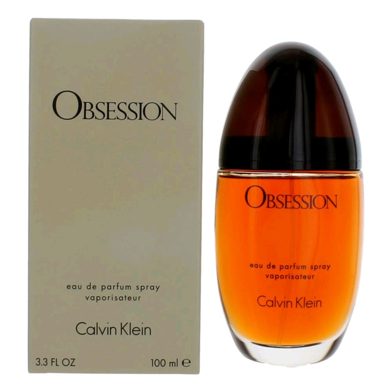 Calvin Klein Obsession women’s 3.3 oz EDP spray bottle, sleek design with the perfume visible inside.