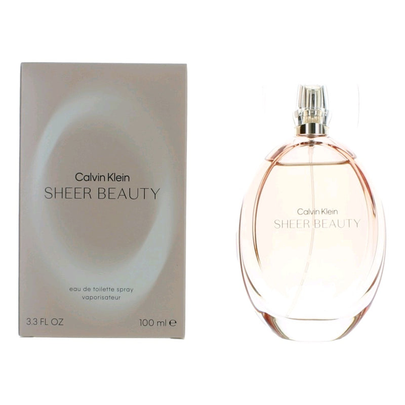 Calvin Klein Sheer Beauty 3.4 oz EDT spray for women, elegant glass bottle with soft pink and white design.