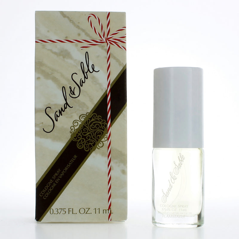 Coty Sand and Sable 0.375 oz women’s cologne spray bottle with elegant packaging and gold accents.