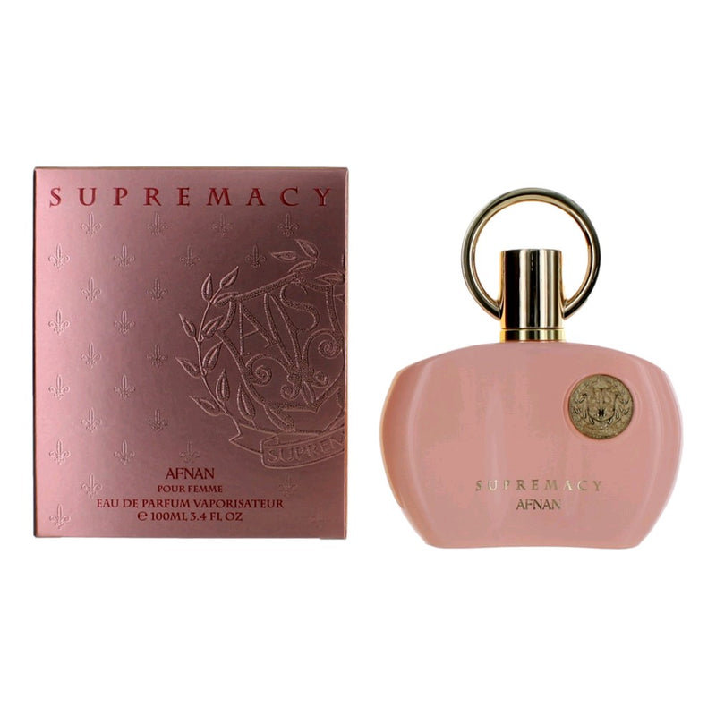 Afnan Supremacy Pink 3.4 oz women’s EDP spray bottle with pink and white packaging, displayed on a neutral background.