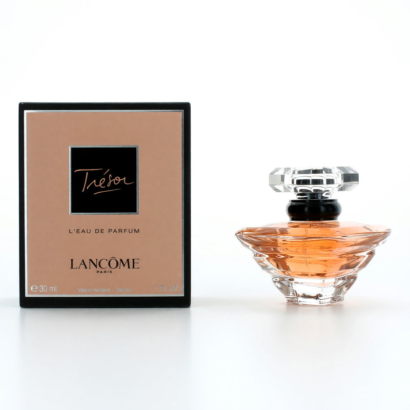 Lancome Tresor 1 oz Eau de Parfum spray for women, elegant glass bottle with silver accents.