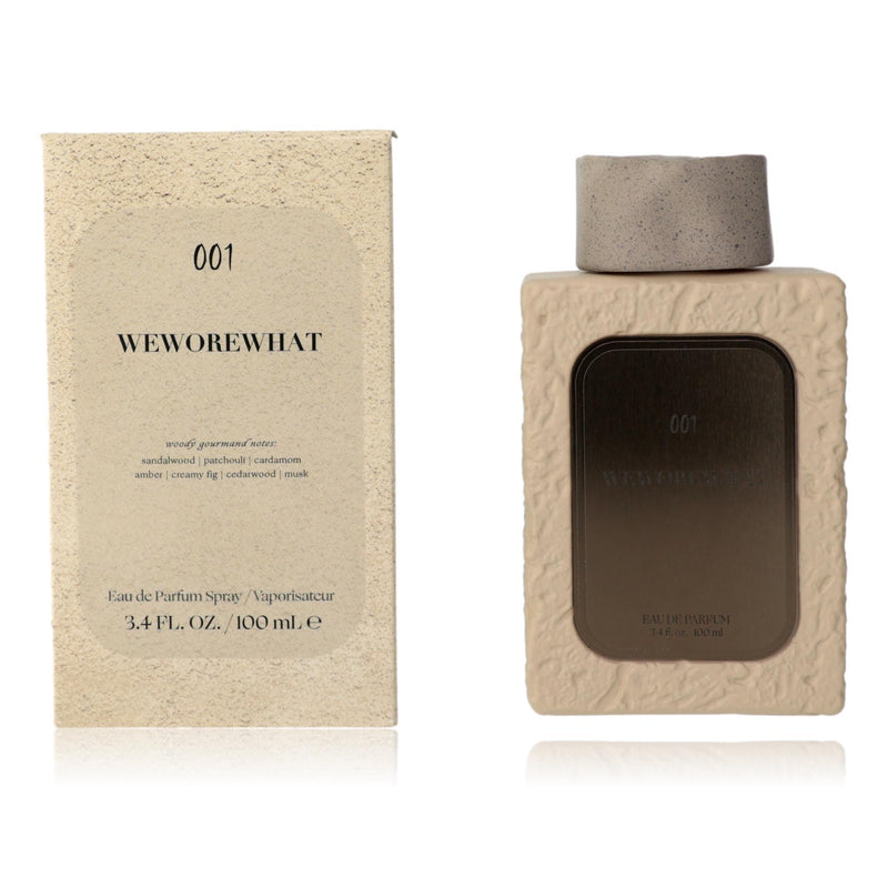 We Wore What 001 by WEWOREWHAT women's 3.4 oz EDP spray bottle, sleek design and elegant packaging.