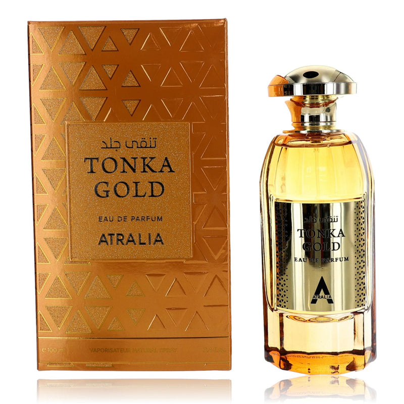 Atralia Tonka Gold unisex 3.4 oz EDP spray bottle, elegant packaging with golden accents, showcasing the fragrance product.
