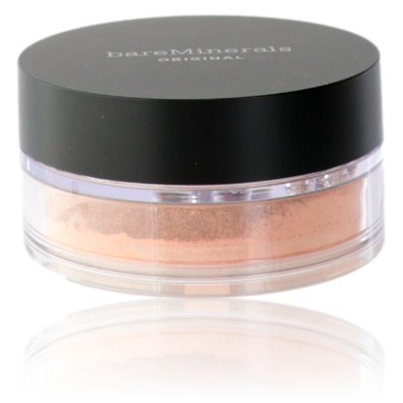BareMinerals loose powder foundation in medium 10 with SPF 15, showing a close-up of the beige mineral powder in a jar.