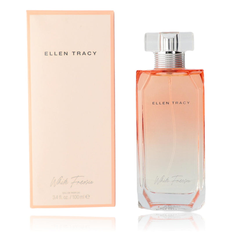White Freesia Ellen Tracy 3.4 oz women’s EDP spray bottle with white floral packaging and elegant design.