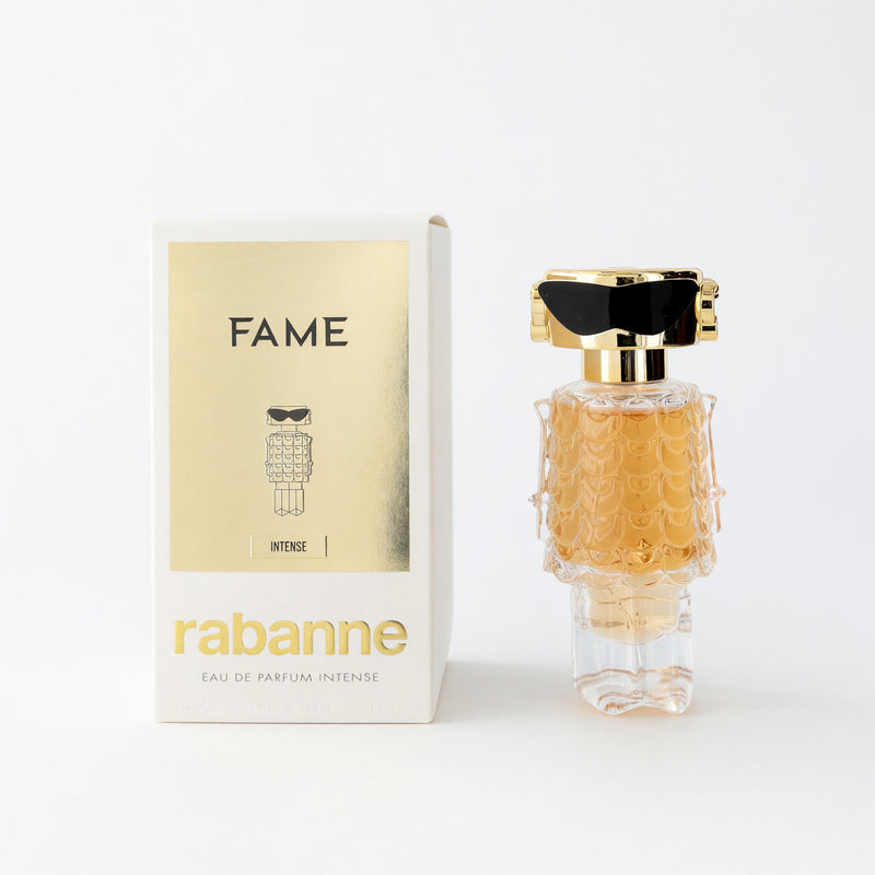 Paco Rabanne Fame Intense 1 oz Eau de Parfum spray for women, sleek glass bottle with gold accents and black cap.