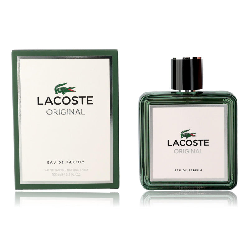 Lacoste by Lacoste men's 3.3 oz eau de parfum spray bottle, sleek design and transparent glass showing the fragrance inside.