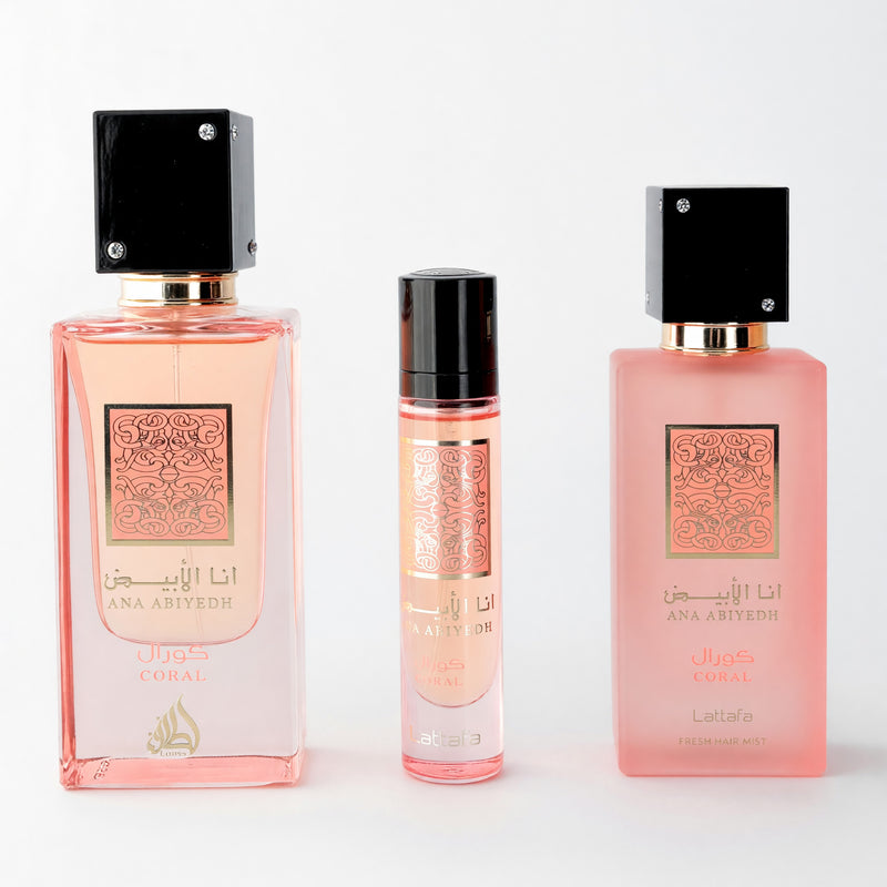 Lattafa Ana Abiyedh Coral 3-piece unisex gift set with perfume bottles and packaging, elegant and vibrant design.
