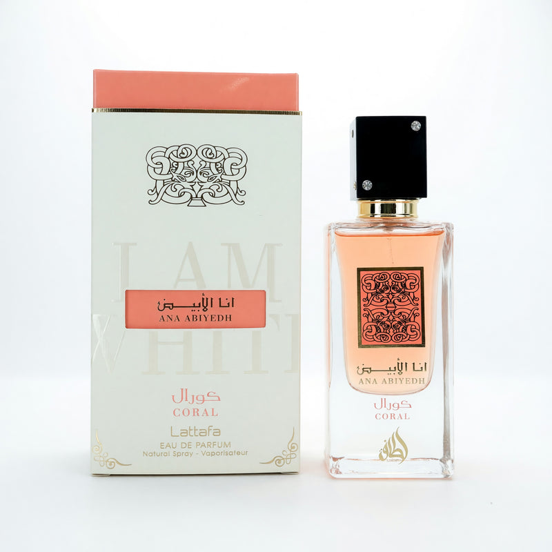 Lattafa Ana Abiyedh Coral unisex 2 oz EDP spray bottle with elegant packaging and floral-orange fragrance accents.