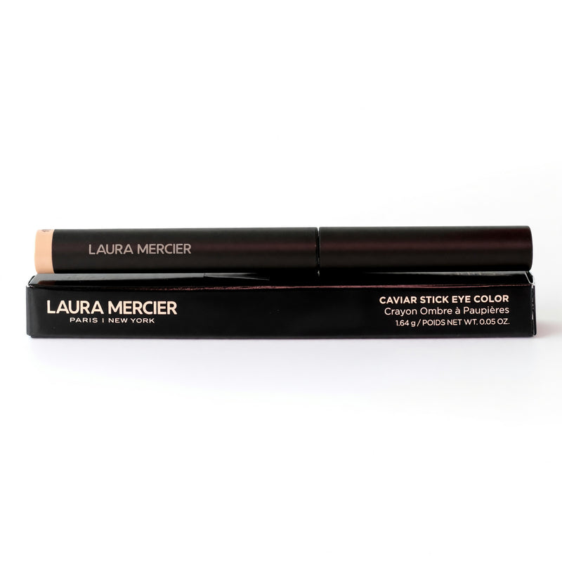 Laura Mercier Caviar Stick Eye Color in Vanilla Kiss, a creamy beige eyeshadow stick for easy eye makeup application.