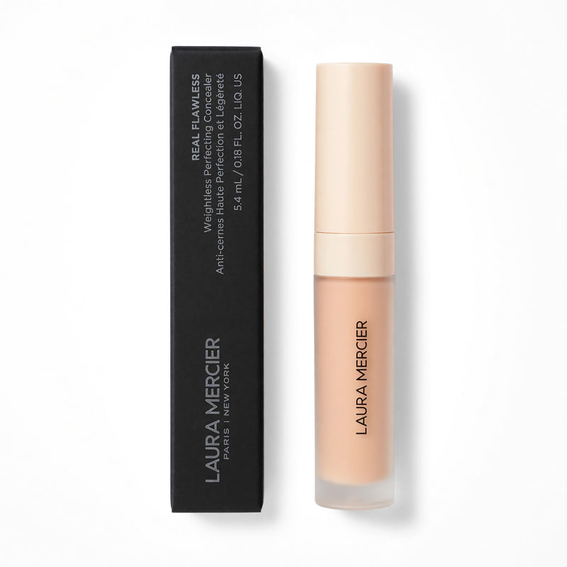 Laura Mercier Real Flawless Weightless Perfecting Concealer in shade 1N0, displayed in its compact container against a neutral background.