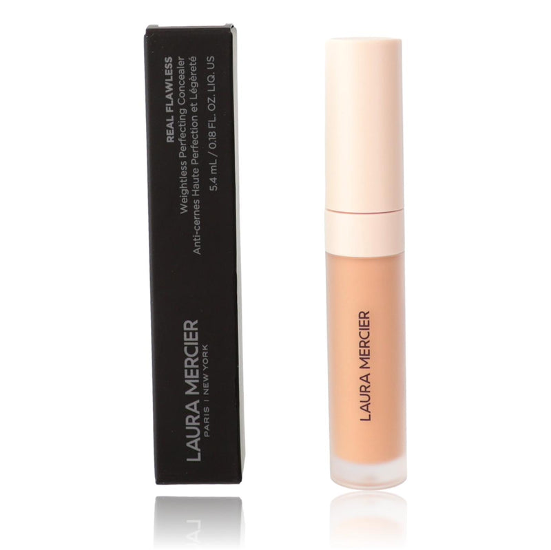 Laura Mercier Real Flawless Weightless Concealer in 2C1, close-up of the 0.18oz tube showing the brand and product label.