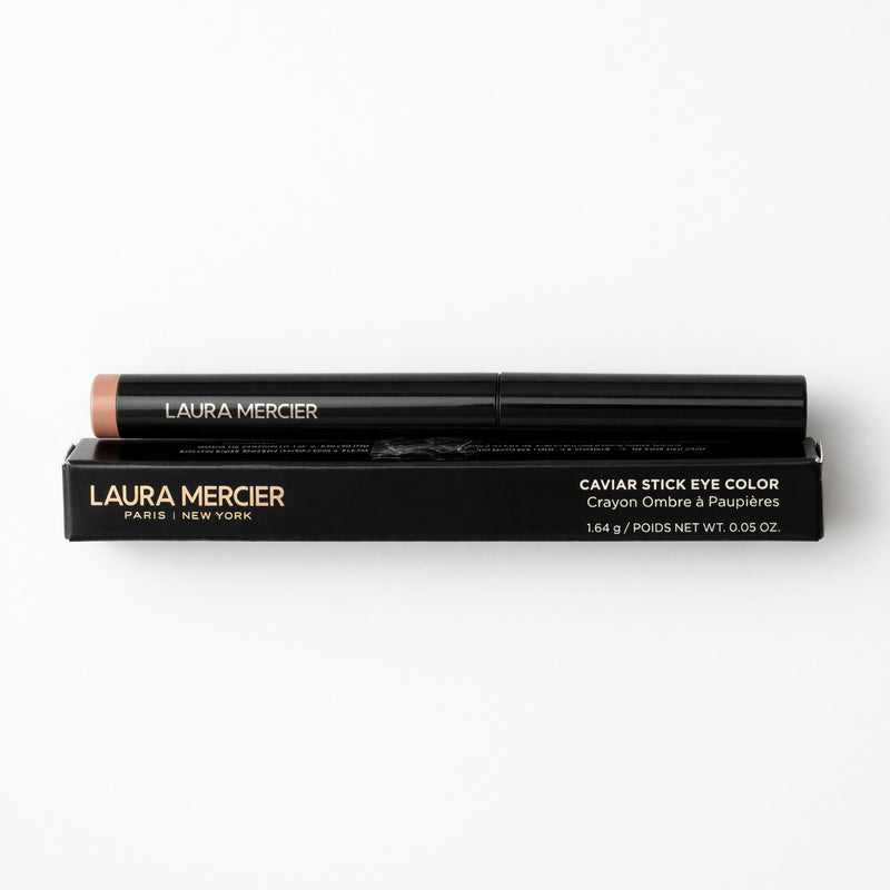 Laura Mercier Caviar Stick Eye Color in Mocha, a creamy eyeshadow stick with a smooth, rich brown shade, displayed in a sleek tube.