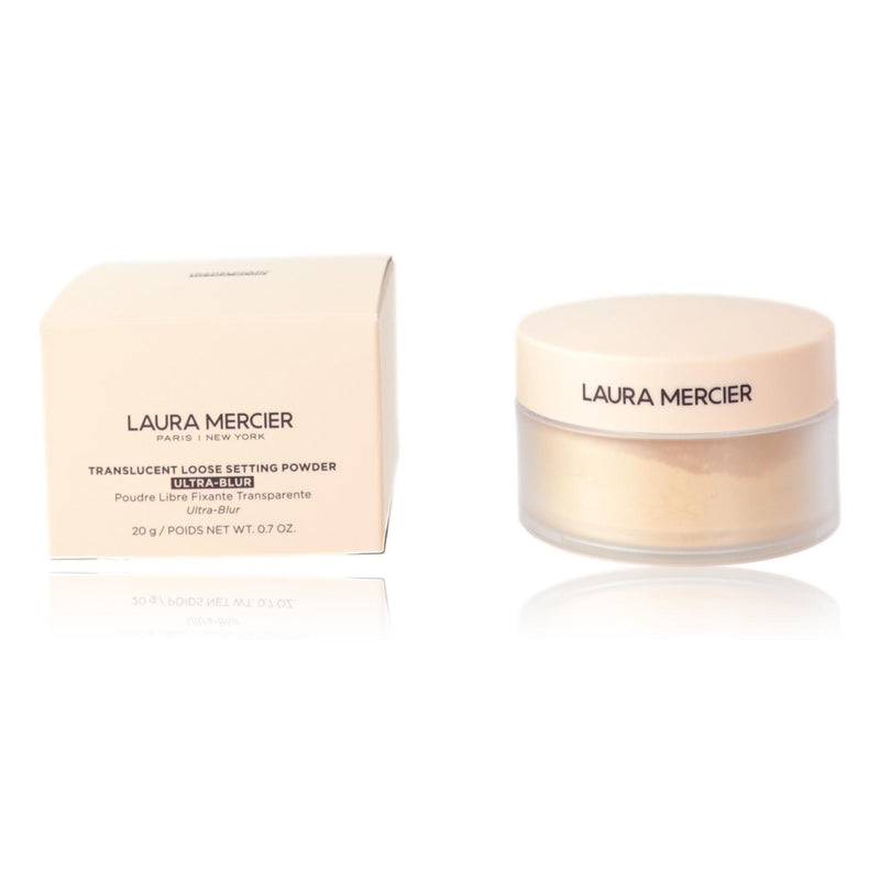 Laura Mercier Ultra-Blur translucent loose setting powder in a jar, with a soft, matte finish and fine texture for a smooth complexion.