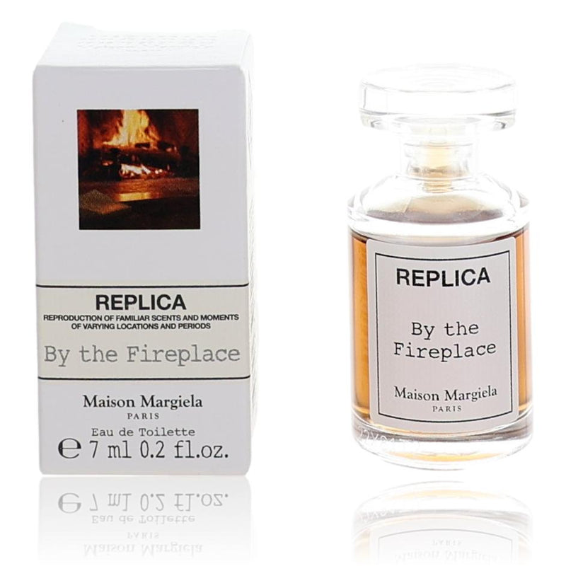 Maison Margiela Replica By The Fireplace unisex 0.2oz EDT splash bottle, featuring warm, smoky fragrance and minimalist design.